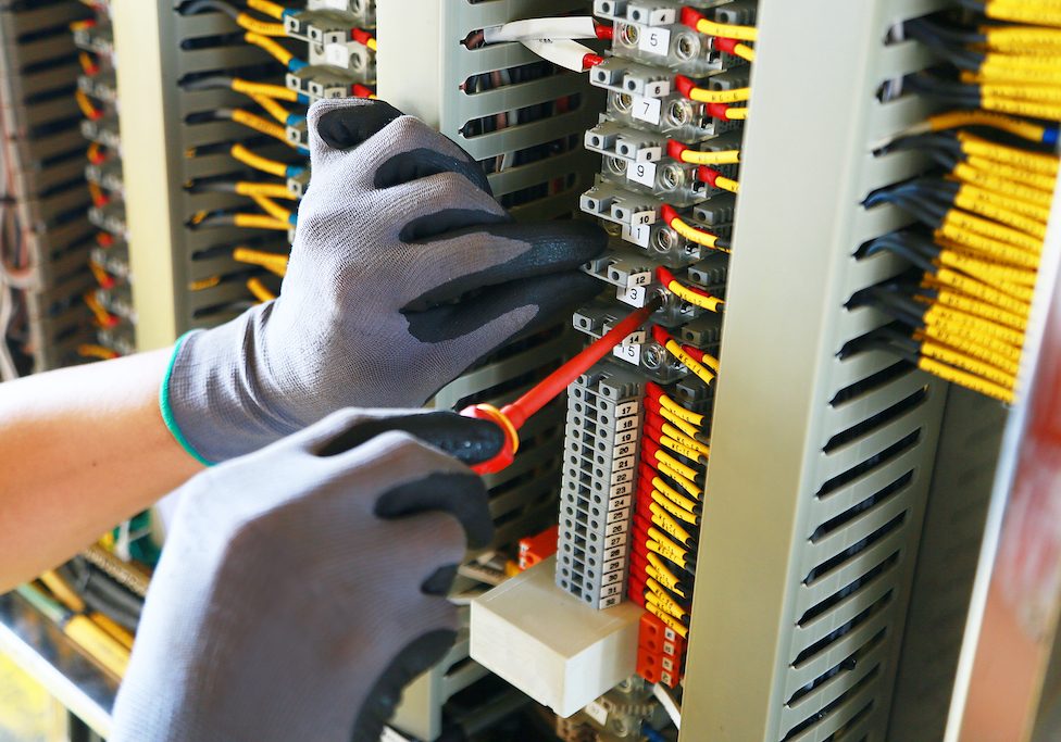 Electrical terminal in junction box and service by technician. Electrical device install in control panel for support program and control function by PLC. routine visit check equipment by technician.